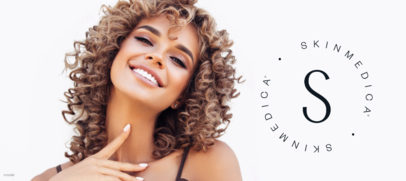 Woman of color against white backdrop touching neck [SkinMedica logo]
