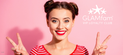 brunette holding fingers in peace sign V's with GLAMfam VIP Loyalty Club logo on pink background